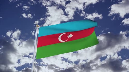 Realistic Waving Flag of Azerbaijan Against Blue Sky
