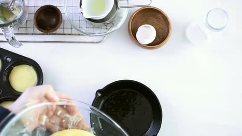 Preparing Pancake Batter in Cast Iron Skillet