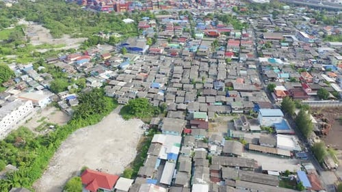 Aerial view of roofs of village houses. Residential buildings in Bangkok Downtown, Thailand.