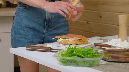 Croissant Sandwich Preparation in Kitchen