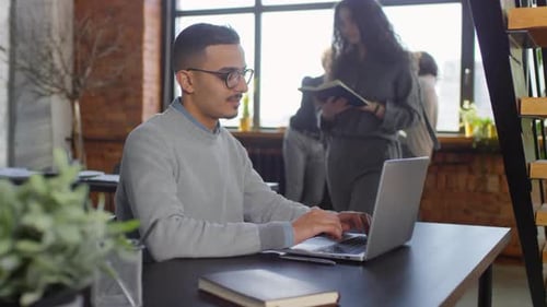 Working Atmosphere In Loft Office