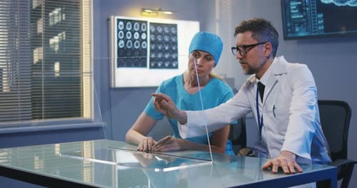 Doctors Using Transparent Display Screen