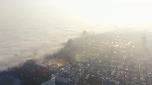 Metropolis in Foggy Weather. The Big City Is Covered in Fog at Dawn. Fog in Kiev, Ukraine