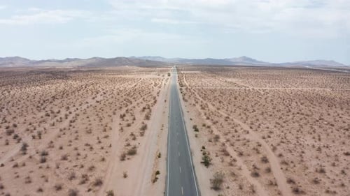 Desert road. Aerial point of view over road in desert.