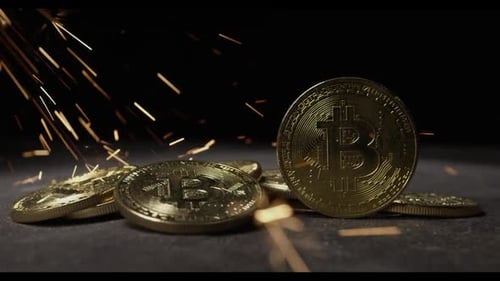 Cryptocurrency on the block chain - close up of bitcoin altcoin physical coins in dynamic setting