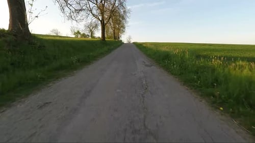 Car driving in spring rural countryside