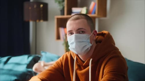 Young Adult Wearing Face Mask Indoors