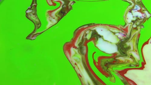 Abstract Fluid Paint Streams on Green Background