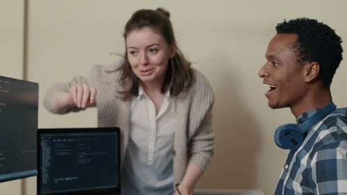 System Engineers Celebrating Successful Code Compiling Doing High Five Hand Gesture