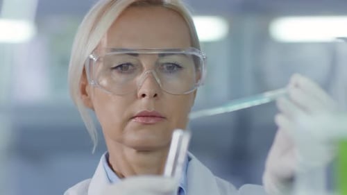 Female Scientist Carrying out Research