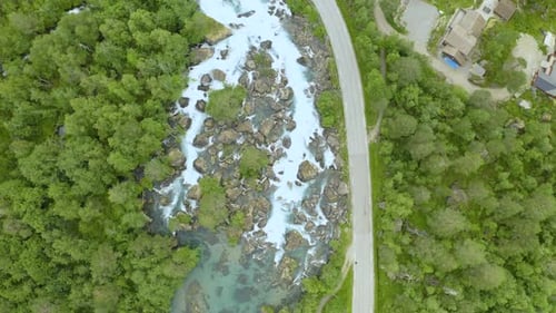 Gudbrandsjuvet Falls Rushing Through Deep Gorge From Valldalen Valley, Andalsnes, Norway. - Aerial S