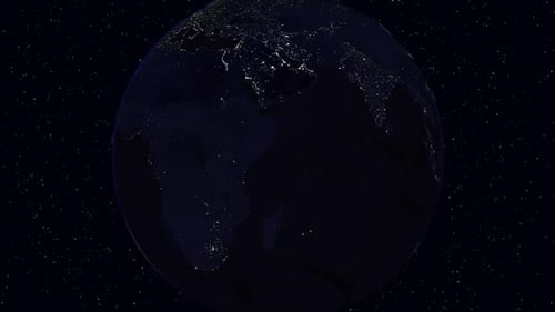 Rotating Planet Earth at Night with Glowing City Lights