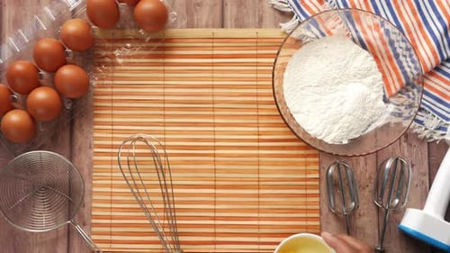 Baking Ingredients on a Wooden Board Top View