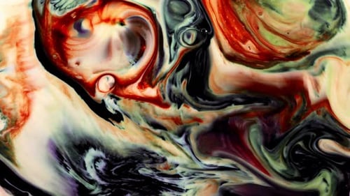 Abstract Colorful Paint Swirling in Liquid
