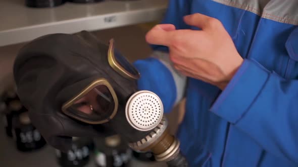Checking gas masks, Industrial Stock Footage ft. managers back & new ...