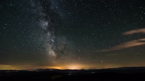Stars Moving in Starry Night Sky with Milky Way