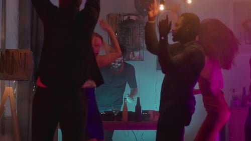 Friends Dancing at a Lively Night Party