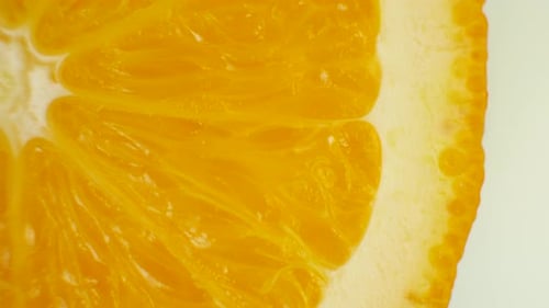 Vibrant Close-Up of a Juicy Orange Slice