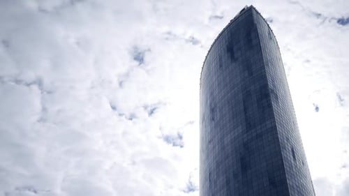 Skyscraper And Clouds