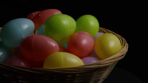 Basket Full of Colorful Plastic Easter Eggs