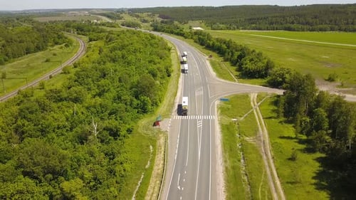 Trucks On A Counytryside Highway