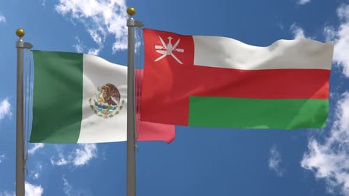 Flags of Mexico and Oman Waving in the Wind