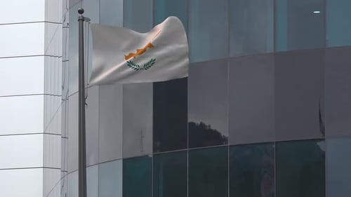 Realistic Cyprus Flag Waving on Modern Building Background