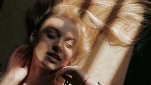 Blonde Woman Lying in the Sunlight