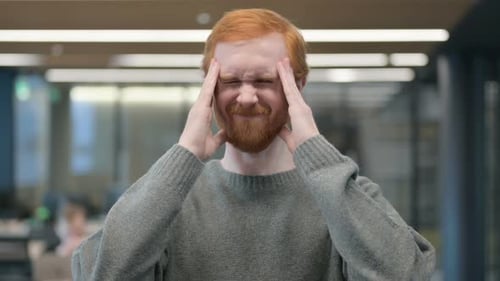 Adult Male Rubbing Temples Experiencing Headache