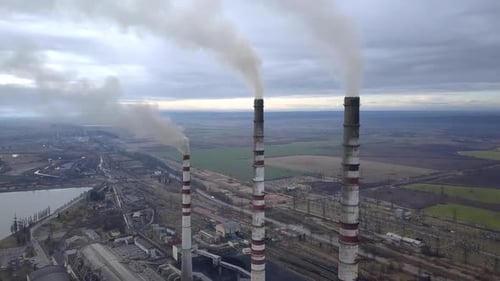 Aerial View of High Chimney Pipes with Grey Smoke From Coal Power Plant