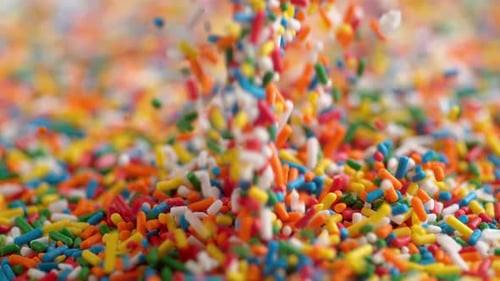 Colorful Sprinkles Falling in a Close Up Shot