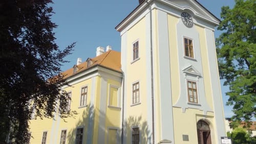 A View of a Front of a Historic Church Set in a Park, on a Sunny Day.