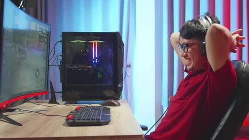 Adult Winning While Playing a Computer Game