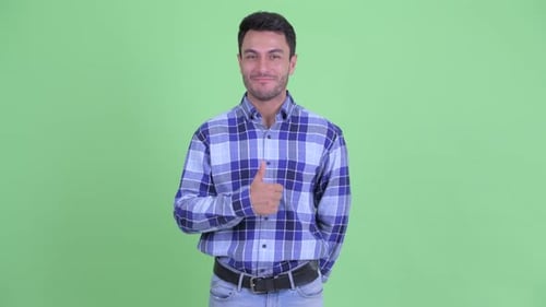 Cheerful Man Gives Thumbs Up on Green Screen