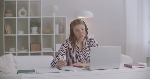 Young Adult Working from Home on Video Call