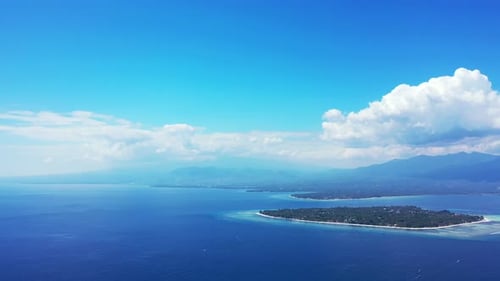 Luxury flying copy space shot of a summer white paradise sand beach and turquoise sea background in