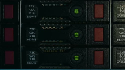 Extreme Close Up of Hard Drives in Server Stack
