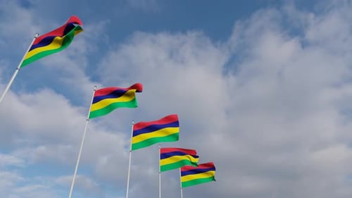 Mauritius Flags Waving against Blue Sky