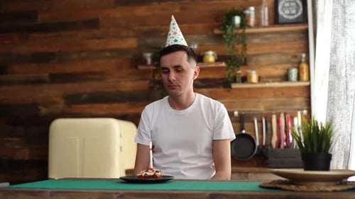 Sad Adult Alone on Birthday in Kitchen