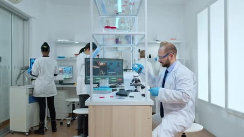 Scientists Working in Modern Lab Examining Samples