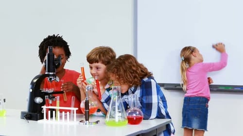Children Doing Science Experiments in Classroom