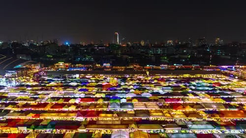 time lapse of Train Night Market Ratchada (Talad Rot Fai) at night in Bangkok, Thailand