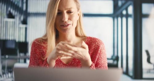 Woman Having Video Chat at Office