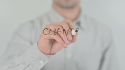 Writing Clients with Black Marker on Clear Surface