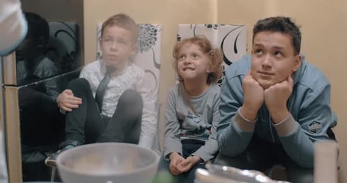 Kids Watch Smoky Science Experiment Indoors