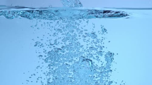 Rising Bubbles in Blue Clear Water
