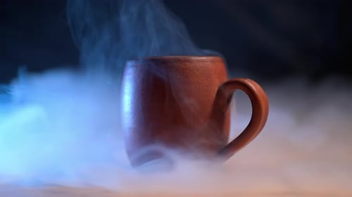 Brown Mug with Rising Smoke, close up