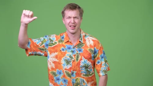 Man with Floral Shirt Giving Thumbs Down