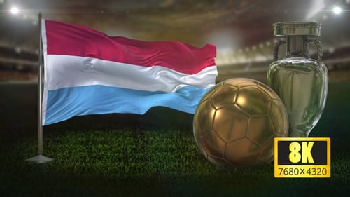 Luxembourg Flag Waving with Soccer Ball and Trophy in Stadium