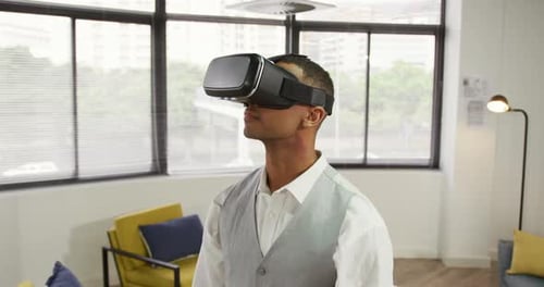 Man Wearing VR Headset Interacting in Virtual Reality